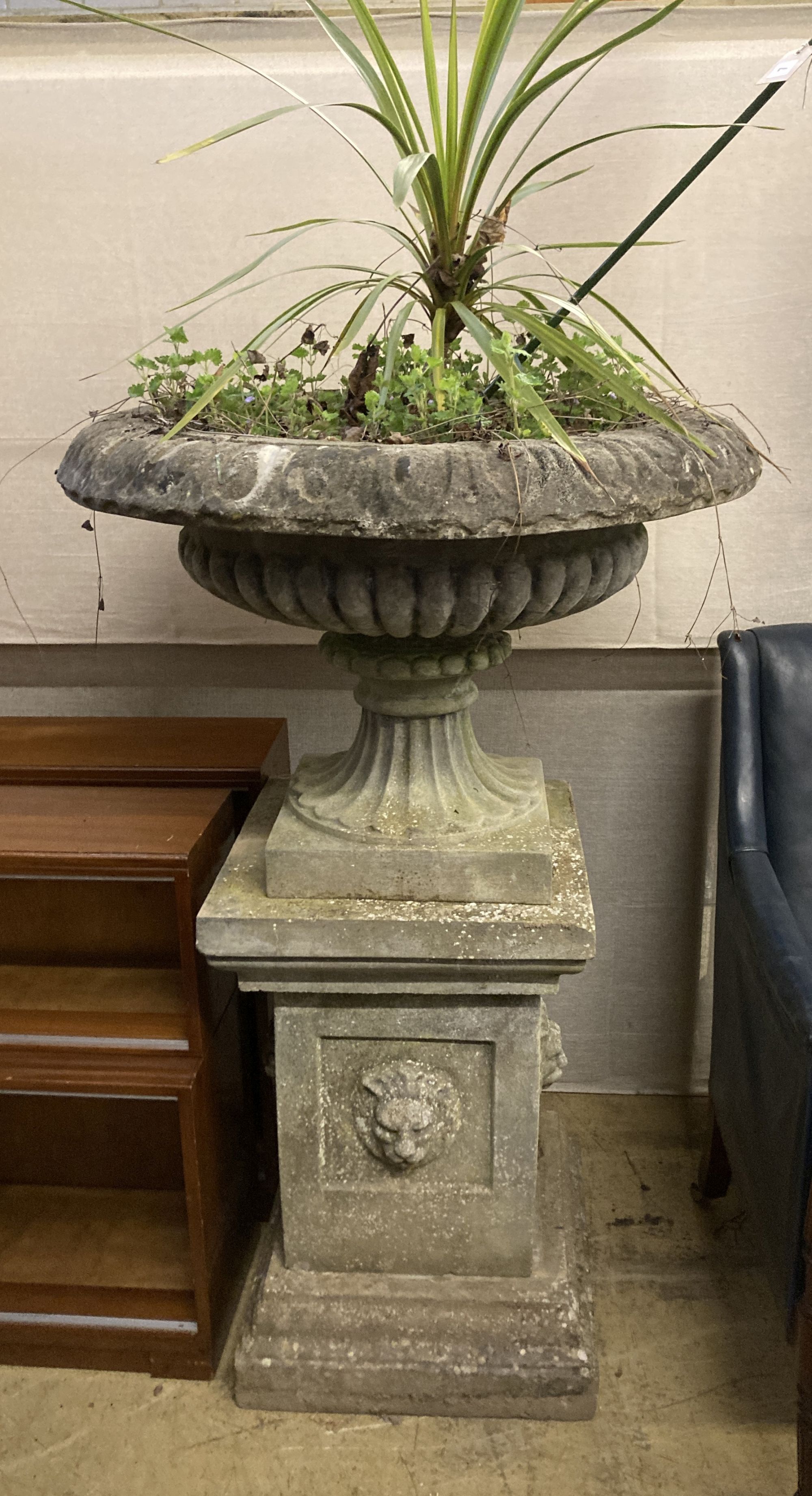 A reconstituted stone Campana garden urn and pedestal, diameter 80cm height 128cm